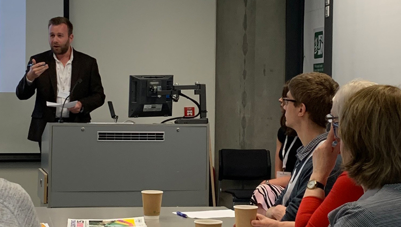 James Underwood lecturing in a lecture theatre at the Univrsity of Huddersfield.
