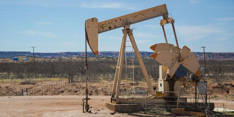 Oil well in a field